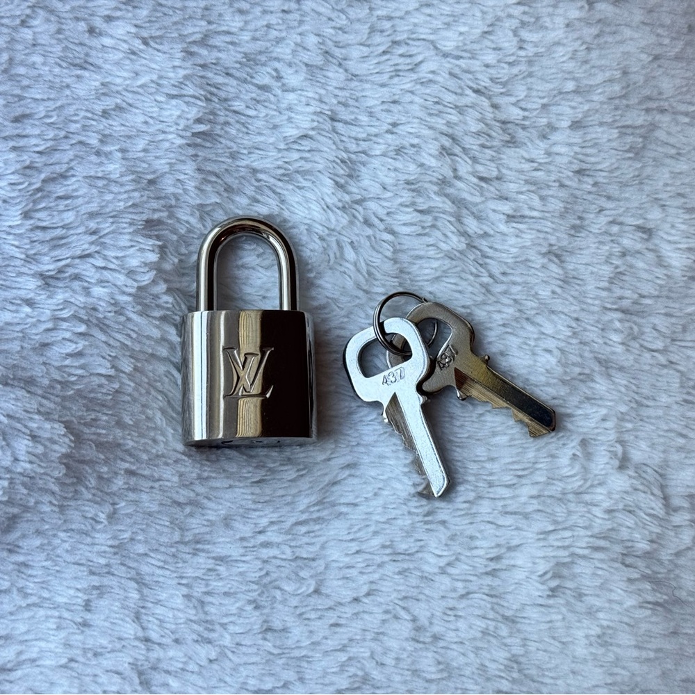 Silver Toned AUTHENTIC Louis Vuitton Padlock and Matching Key Set